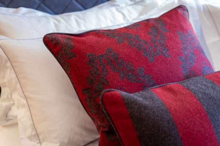 Hermes bedroom pillows & cushions details at at luxury Chalet Artemis St Anton Austria