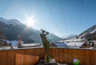 Luxury Chalet Artemis St Anton Austria statue with snow view